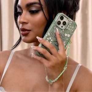 Velvet Caviar Green Heart Phone Charm